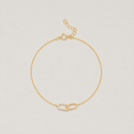 Bracelet en argent 925 plaqué or avec deux maillons ovales, dont un serti d’oxydes de zirconium transparents