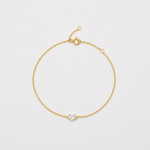 Bracelet délicat en argent 925 plaqué or avec pierre solitaire en oxyde de zirconium transparent