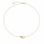 Collier en argent 925 plaqué or avec pendentif ovale géométrique sur chaîne fine, présenté sur fond blanc