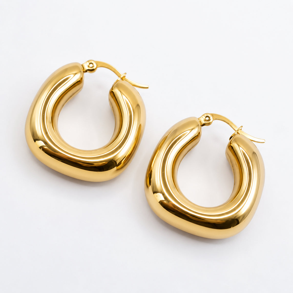 Boucles d’oreilles créoles épaisses en acier inoxydable plaqué or, à forme organique et finition lisse