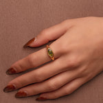 Gold-plated stainless steel ring with marquise-cut green cubic zirconia stone