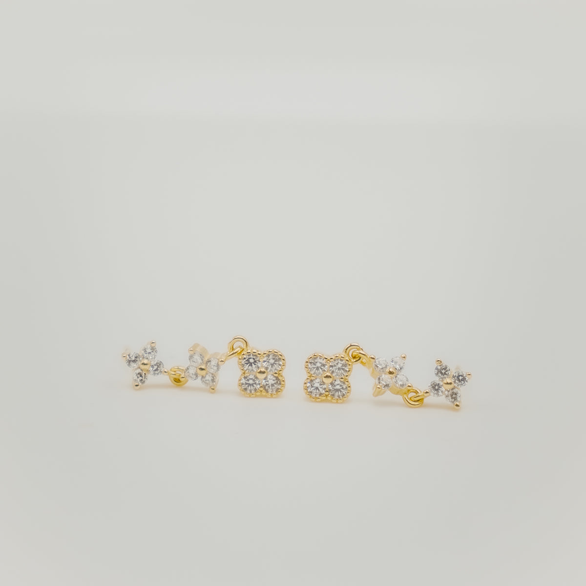 old-plated stainless steel drop earrings with clear cubic zirconia floral clusters
