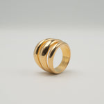 Gold-plated stainless steel chunky ring with four rounded parallel bands 