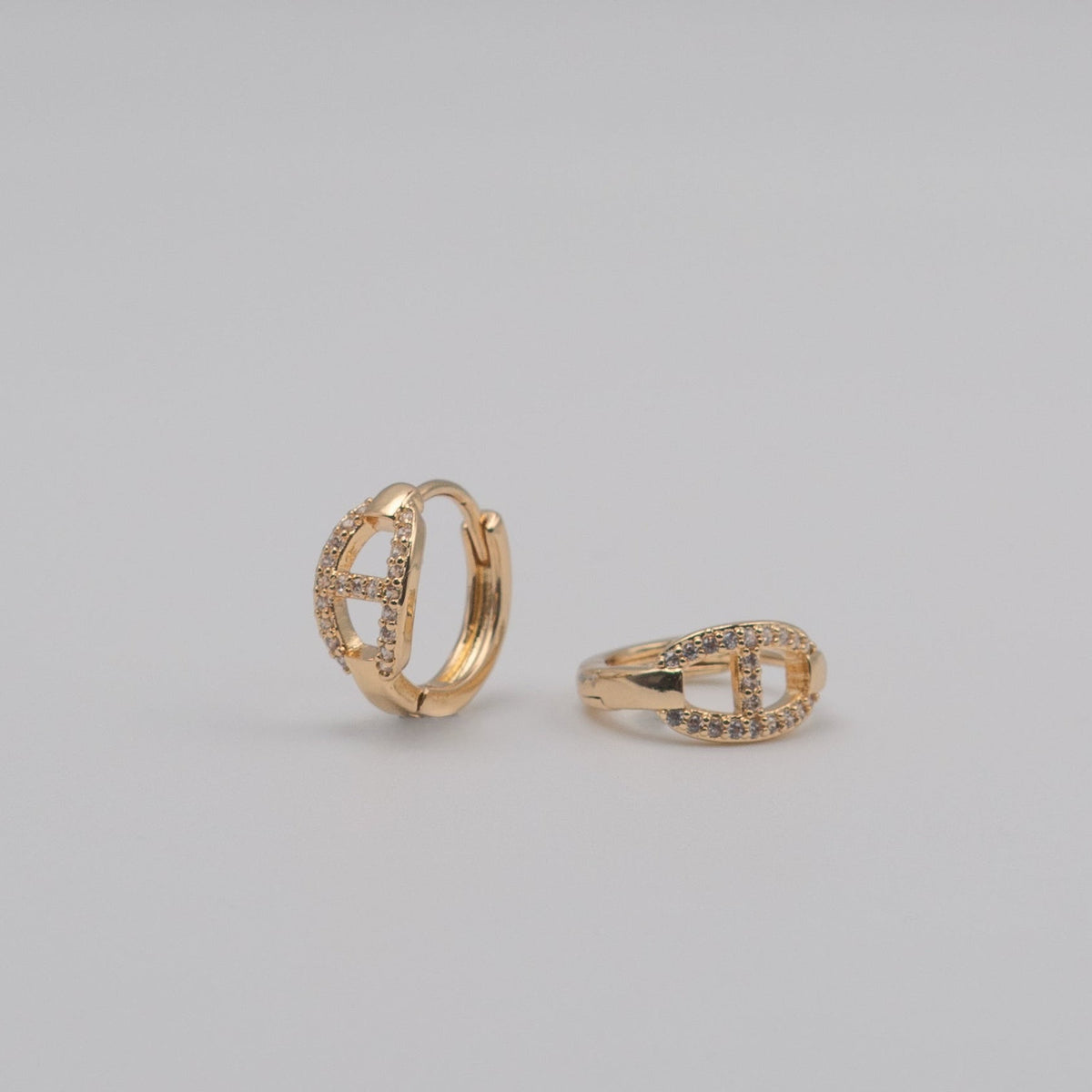 Gold-plated stainless steel huggie earrings with pavé cubic zirconia link details