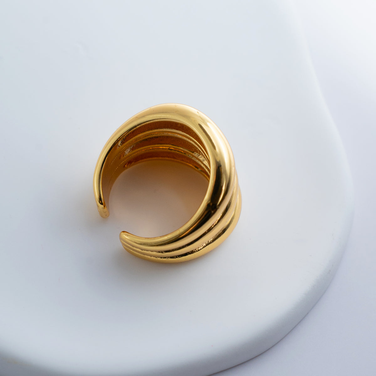 Gold-plated stainless steel chunky ring with three rounded stacked bands