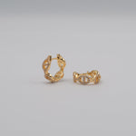 Gold-plated sterling silver drop earrings with double circular cubic zirconia details 