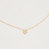 Gold-plated sterling silver necklace with a four-petal cubic zirconia pendant on a light background