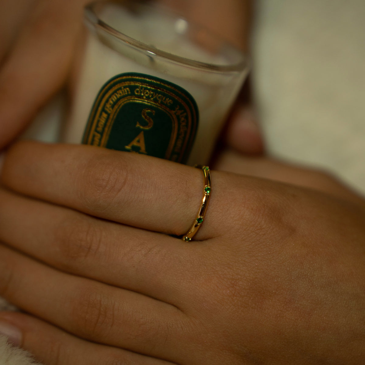 Gold-plated sterling silver delicate band ring with small green stones