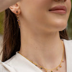 Gold-plated sterling silver drop earrings with purple, orange and black cubic zirconia stones