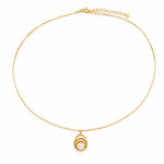Gold-plated sterling silver necklace with a sculptural pendant featuring a natural pearl