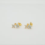 Gold-plated sterling silver stud earrings with opal flower details and clear cubic zirconia 