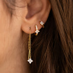 Gold-plated sterling silver earrings stack with clear cubic zirconia pavé stones and a small clover detail