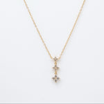 Gold-plated sterling silver drop necklace with three clear cubic zirconia flower motifs