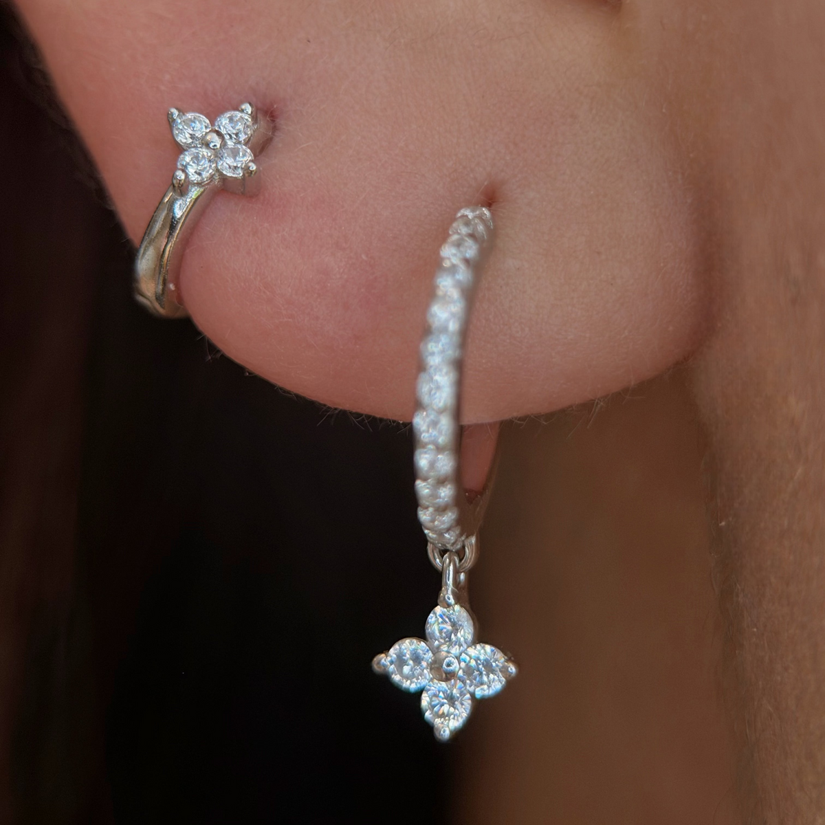 Rhodium-plated 925 sterling silver pavé hoop earrings with flower cubic zirconia charms