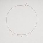 Rhodium-plated sterling silver necklace with delicate cubic zirconia flower charms 