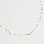 Rhodium-plated sterling silver necklace with delicate cubic zirconia flower details