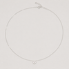 Rhodium-plated sterling silver necklace with a small four-petal cubic zirconia pendant on a light background