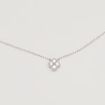 Rhodium-plated sterling silver necklace with four-petal cubic zirconia pendant 