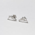 Rhodium-plated sterling silver stud earrings with marquise and round cubic zirconia leaf details