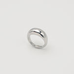 Polished silver stainless steel rounded band ring with a smooth dome profile on a light background