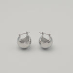 Silver stainless steel sphere drop earrings with a polished finish