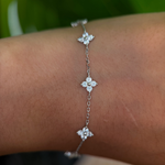 Sterling silver floral bracelet with clear cubic zirconia stones