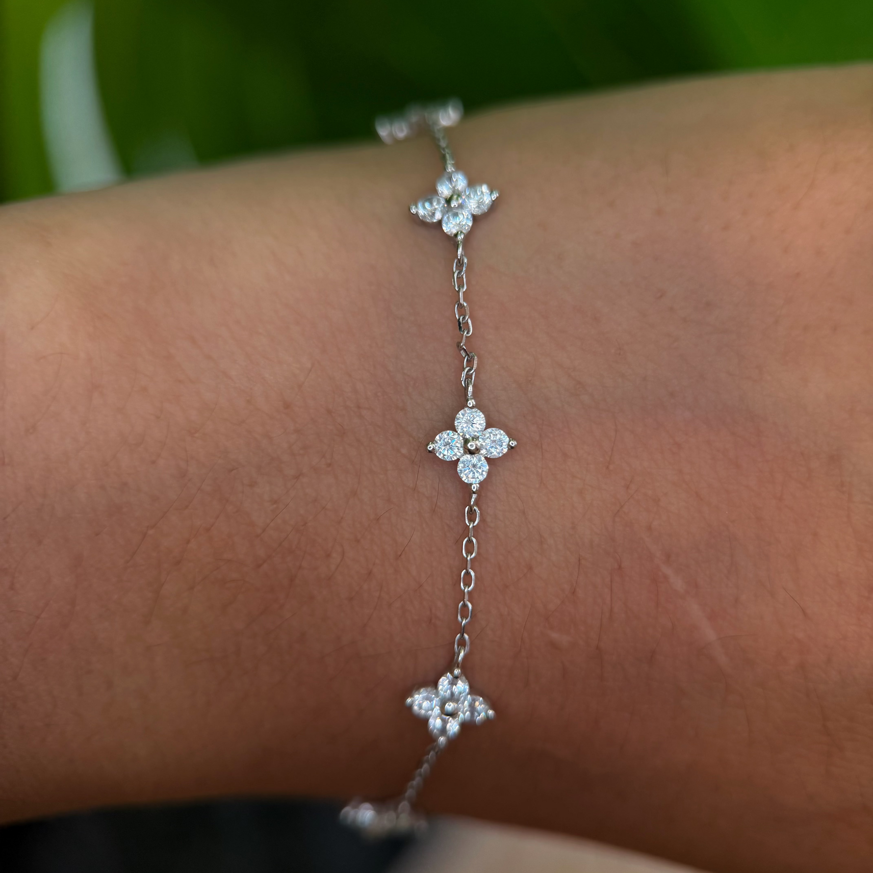 Sterling silver floral bracelet with clear cubic zirconia stones
