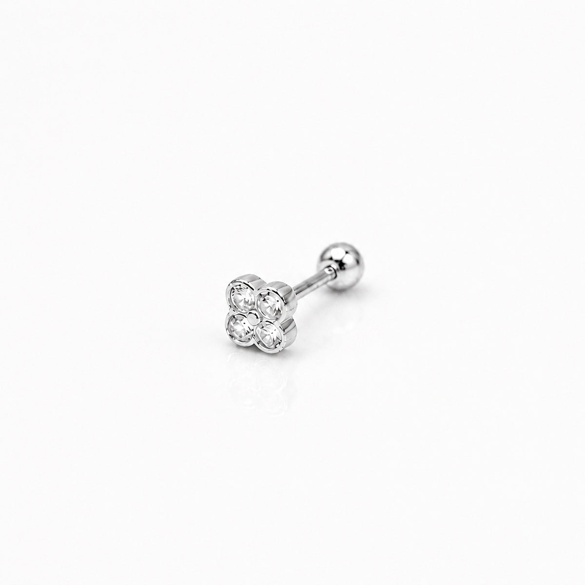 Sterling silver flower round-back ear stud with clear cubic zirconia stones on a white background